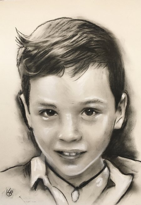 portrait enfant dessin au fusain pastel noir et blanc portraitiste professionnel magicien en close up caricaturiste